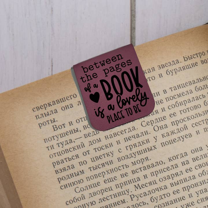 Between The Pages - Magnetic Leatherette Bookmark - Choose your leatherette color! for wholesale by Smashing Ink Vinyl