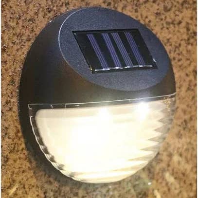 Living Accents Black Deck Solar Lights Powered LED Utility Light 4 Pack for wholesale by OutdoorSolarOutlet