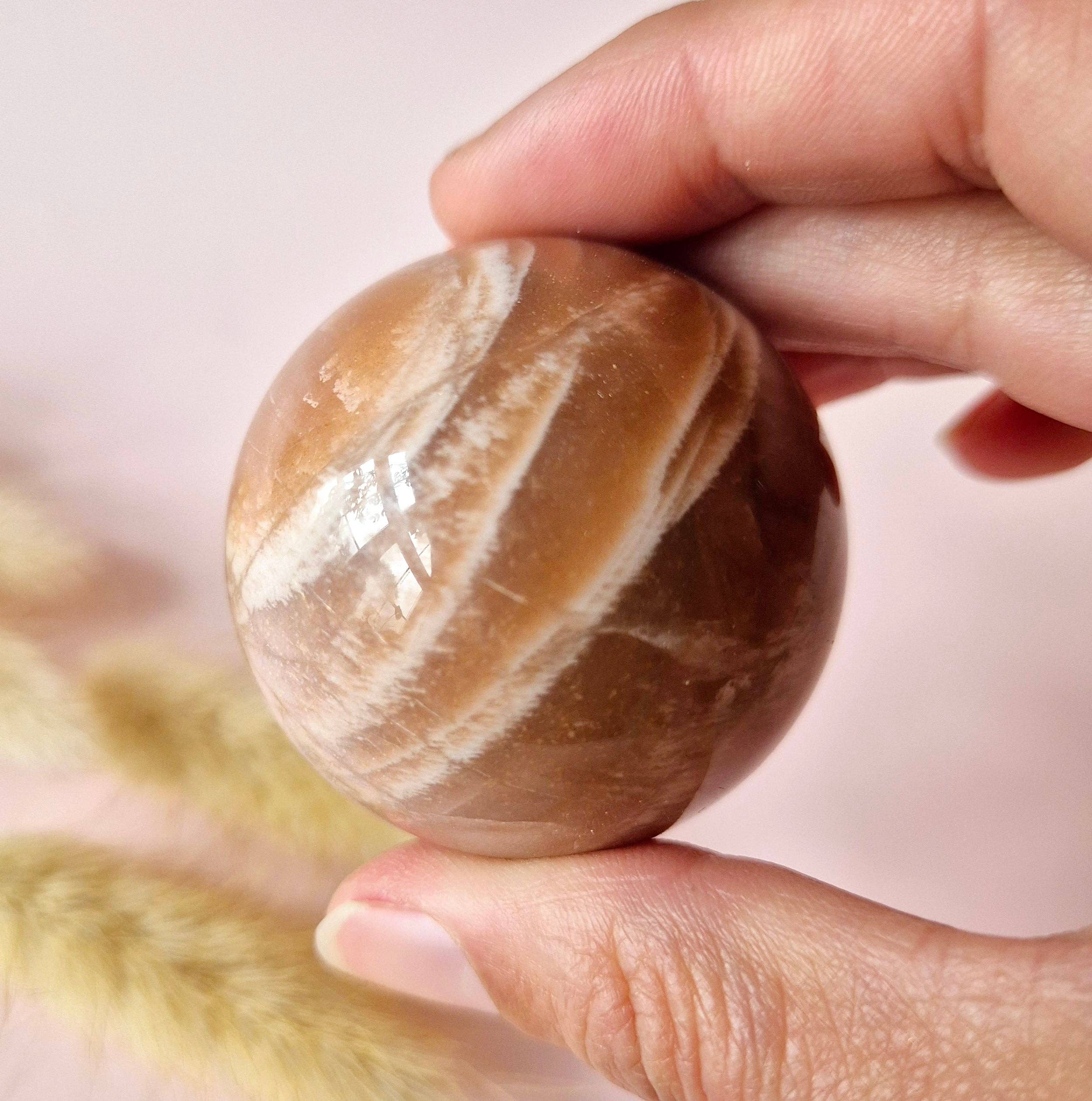 Moonlight Gemstones - Wholesale Spiritual Stone/Crystal - Crystal Gemstone Golden Sunstone Sphere with Blue & Gold Flash | 45–63 mm sphere13