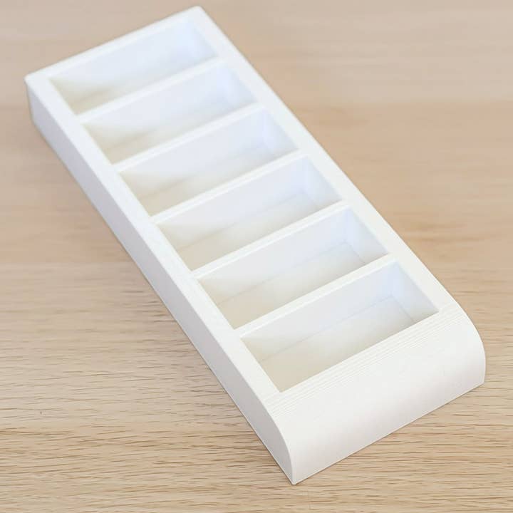 Mixie Market - Wholesale Retailer display stand/case - White Clamshell Display Stand0