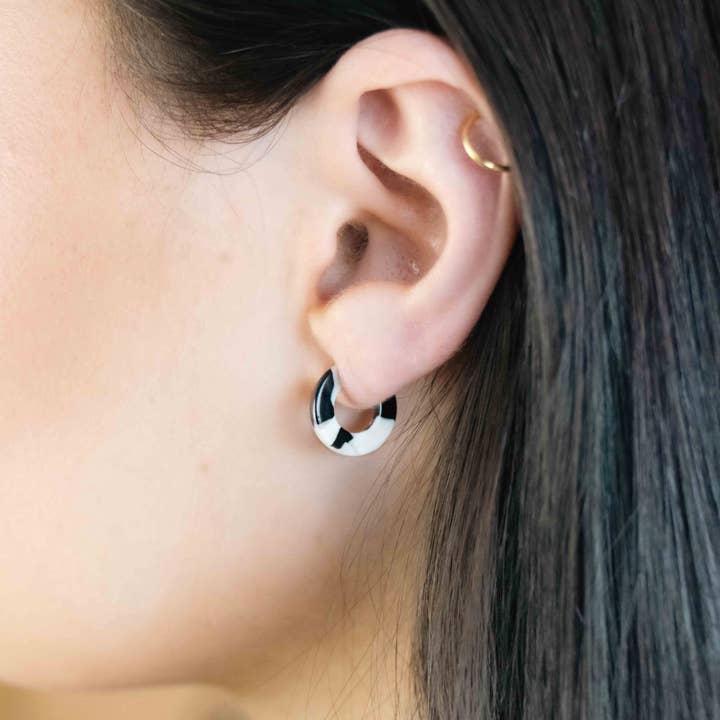 Black & White Tortoiseshell Huggie Hoop Earrings for wholesale by Amber & Orange