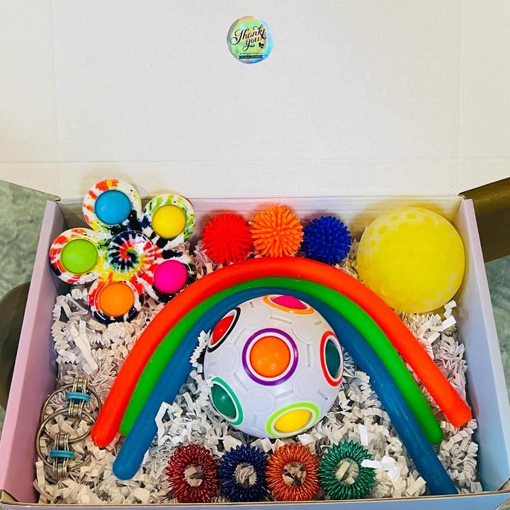 Colorful brain teaser fidget box! for wholesale by Sweetest Fidgets