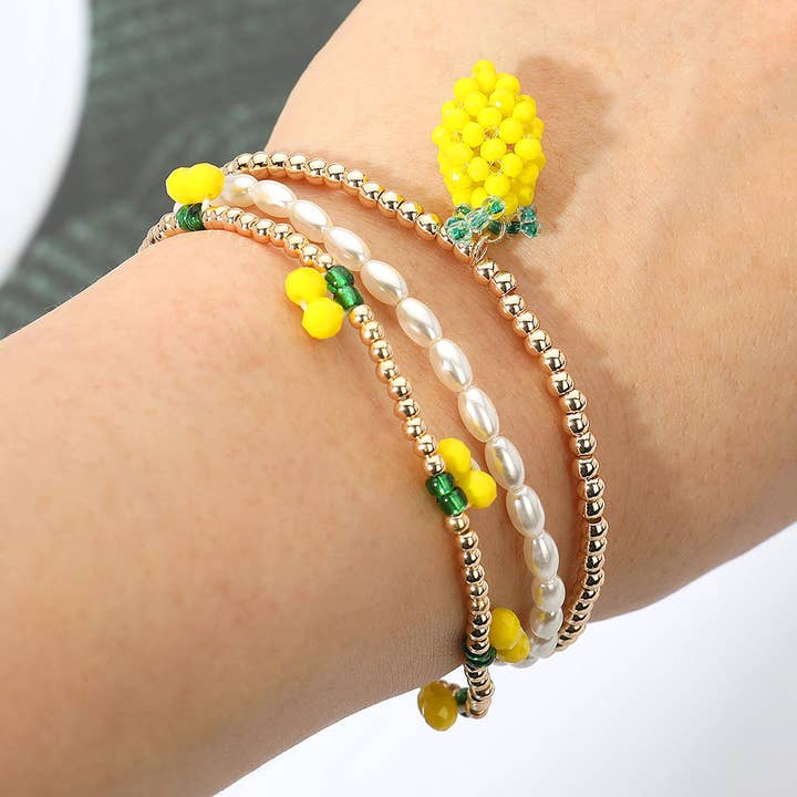 3PCS - Braccialetti Multistrato Elasticizzati con Perline di Semi di Limone e Perle per la vendita all'ingrosso da parte di Sensibling Corp.
