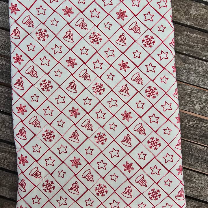 Padded book cover Christmas red ornaments white background for wholesale by laubelgo