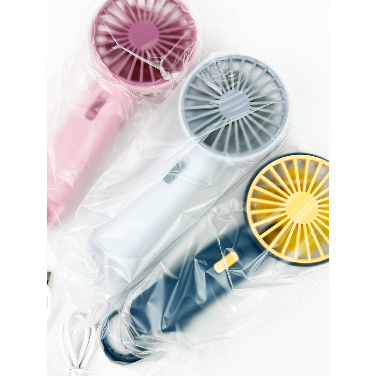 MIX COLOR Portable Hand Fan with Pull out Stand for wholesale on Faire6