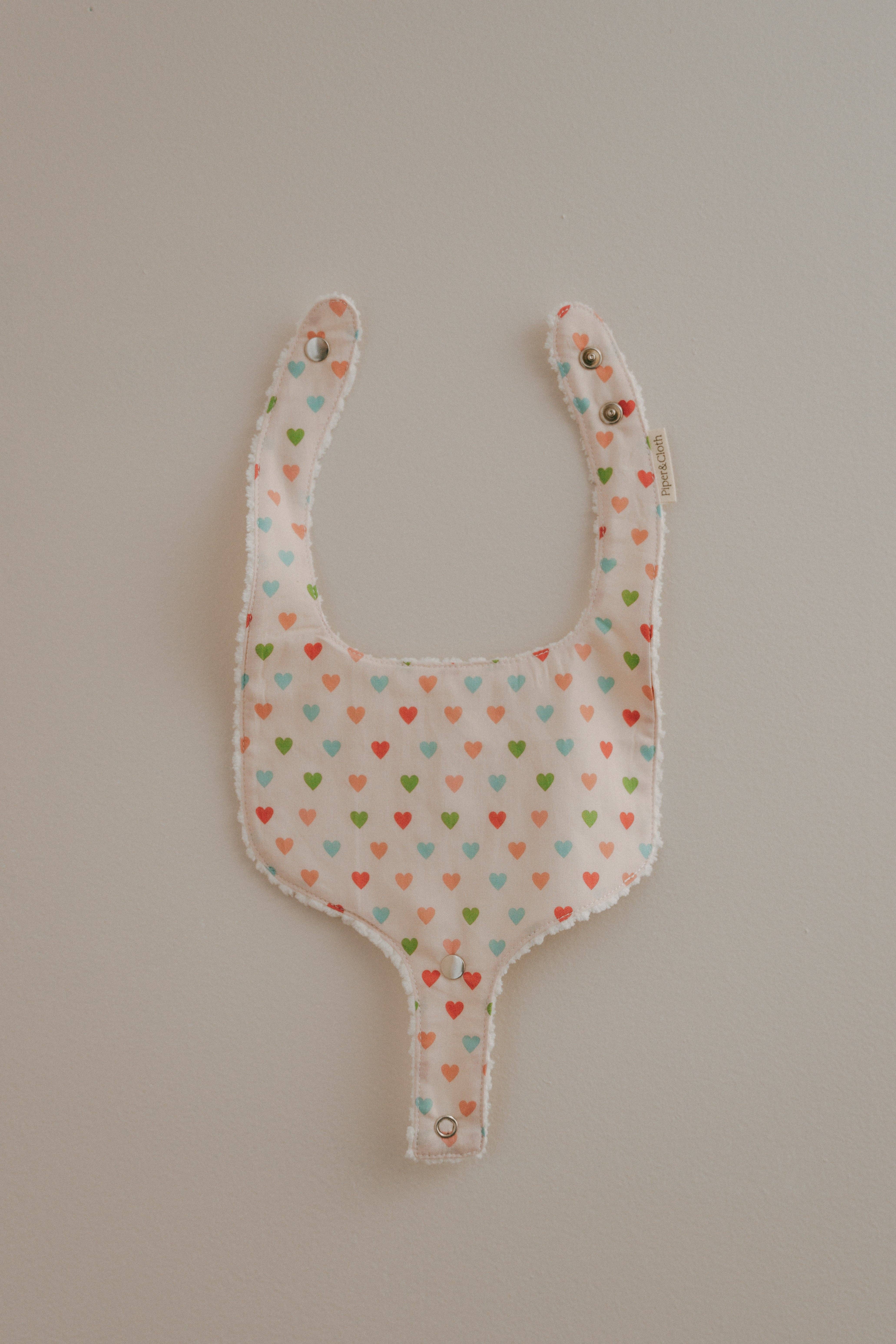Pacifier Bib- Hearts for wholesale on Faire4