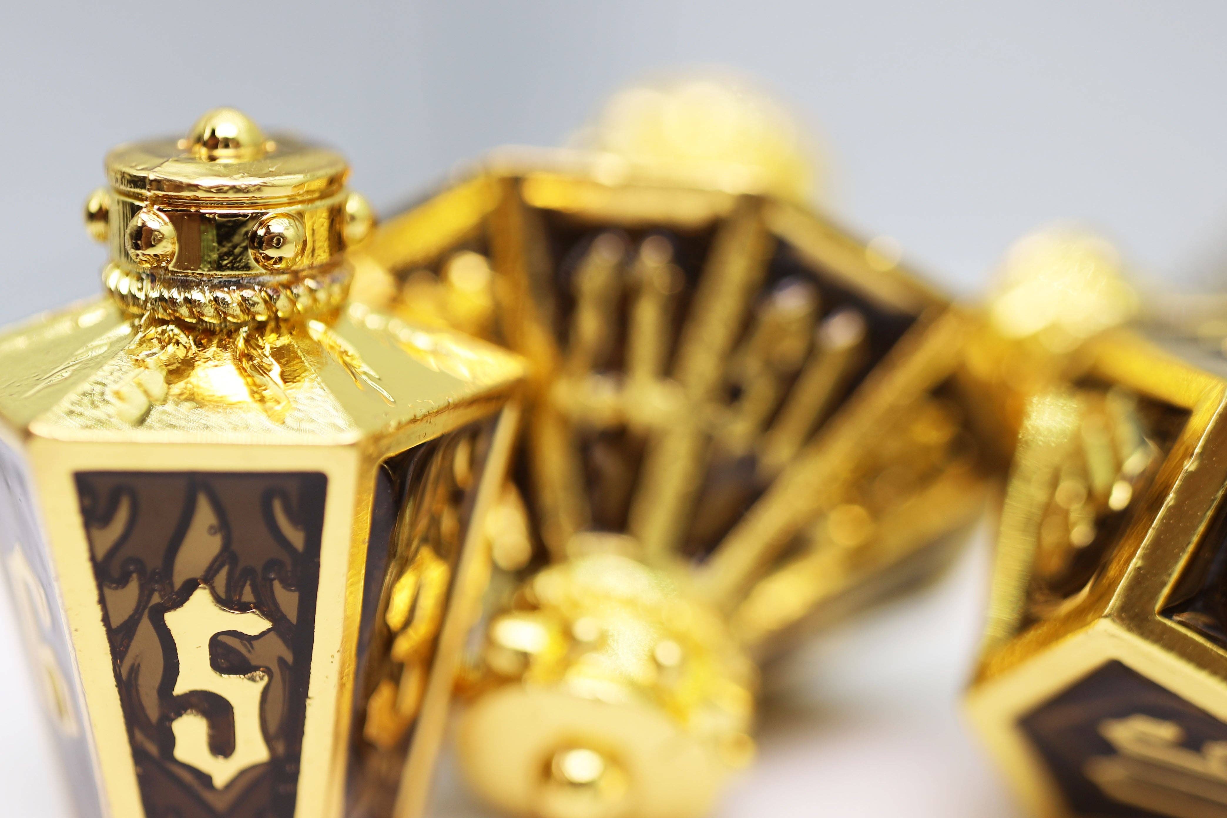 Foam Brain Games - Wholesale Dice - Moonlit Lantern: Golden Earthen Flame - Metal RPG Dice Set4