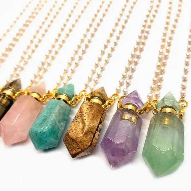 Gemstone Perfume Bottle Stainless Steel Gift boxed Necklace and other Purchase Wholesale essential oil pendants. Free Returns & Net 60 Terms on Faire trending on Faire.