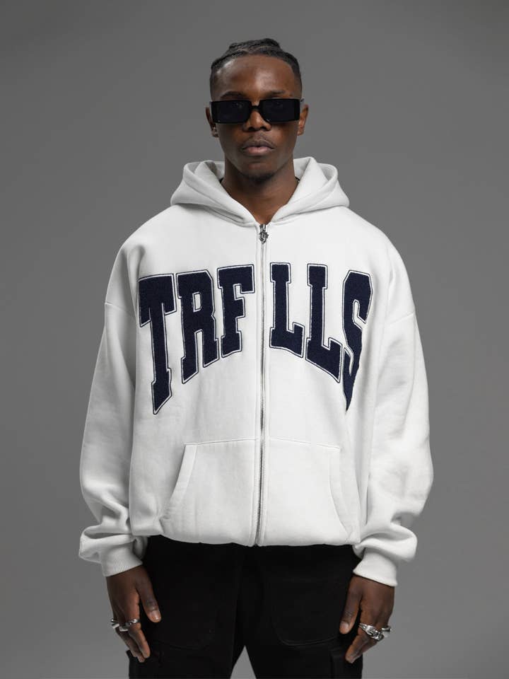 Felpa con zip TRFLLS in tinta crema per la vendita all'ingrosso da parte di True Fellas