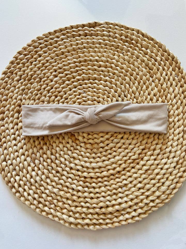 Light nude adjustable knot headband for wholesale by Twig + Roe