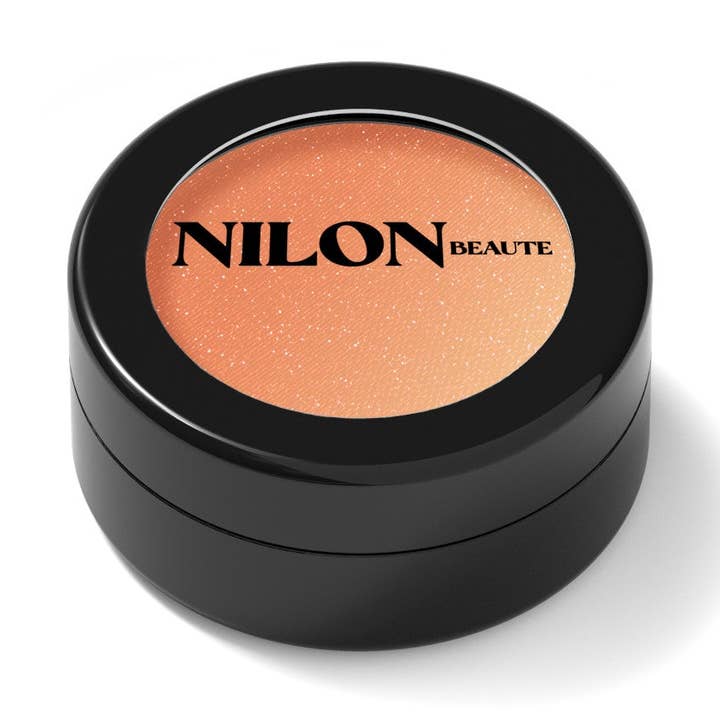 Mimosa à Tulum : poudre lumineuse, lumière et ombres pour la vente par Nilon Beaute