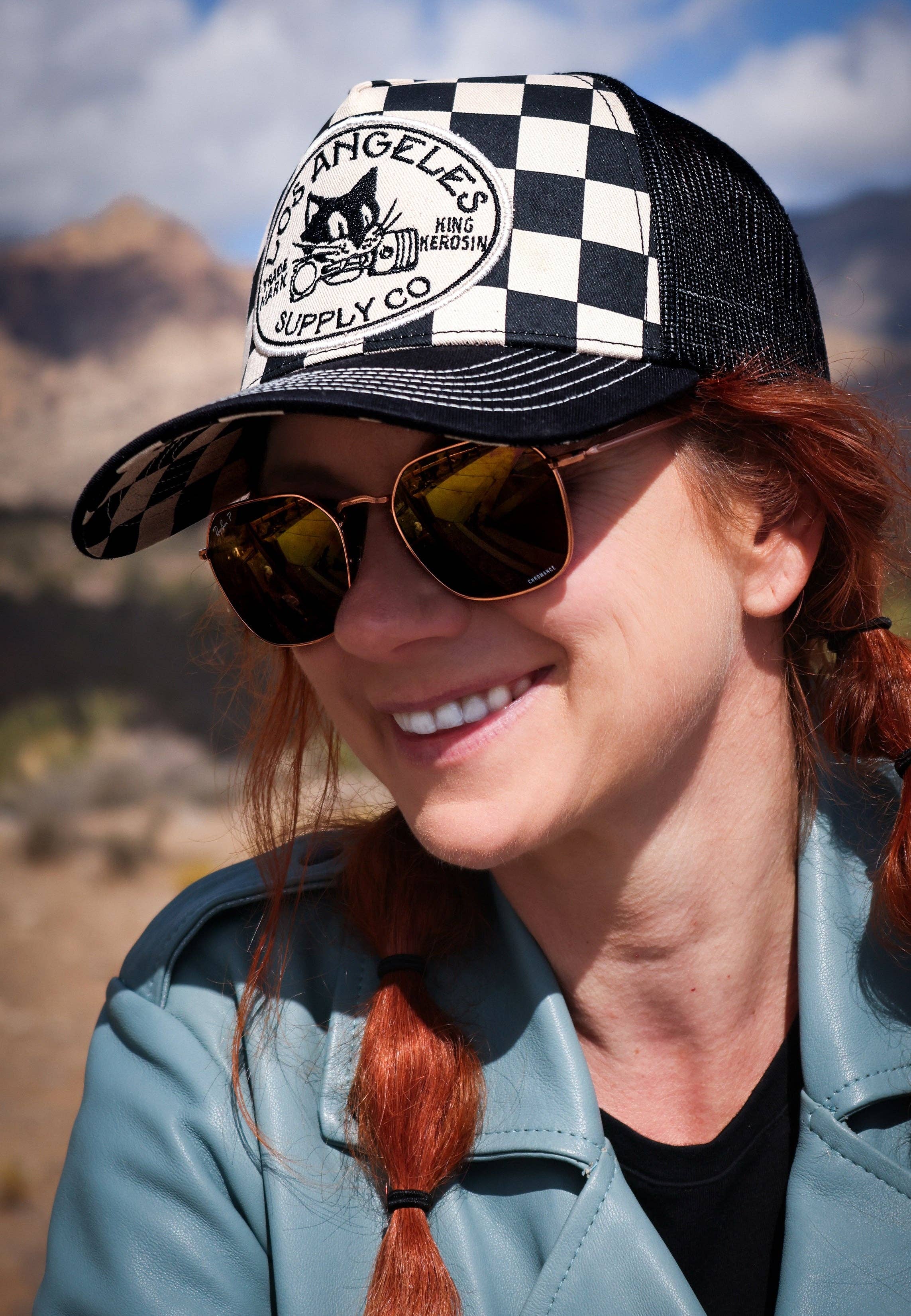 black Trucker Cap "Los Angeles Supply Co" for wholesale on Faire12