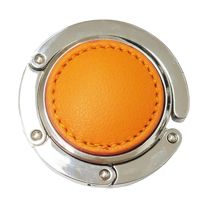 Leather bag hook in various colors for wholesale by Roberto Mantellassi