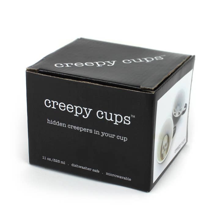 Black Skull | Ceramic Creepy Surprise Mug (11 oz. Black) for wholesale on Faire5
