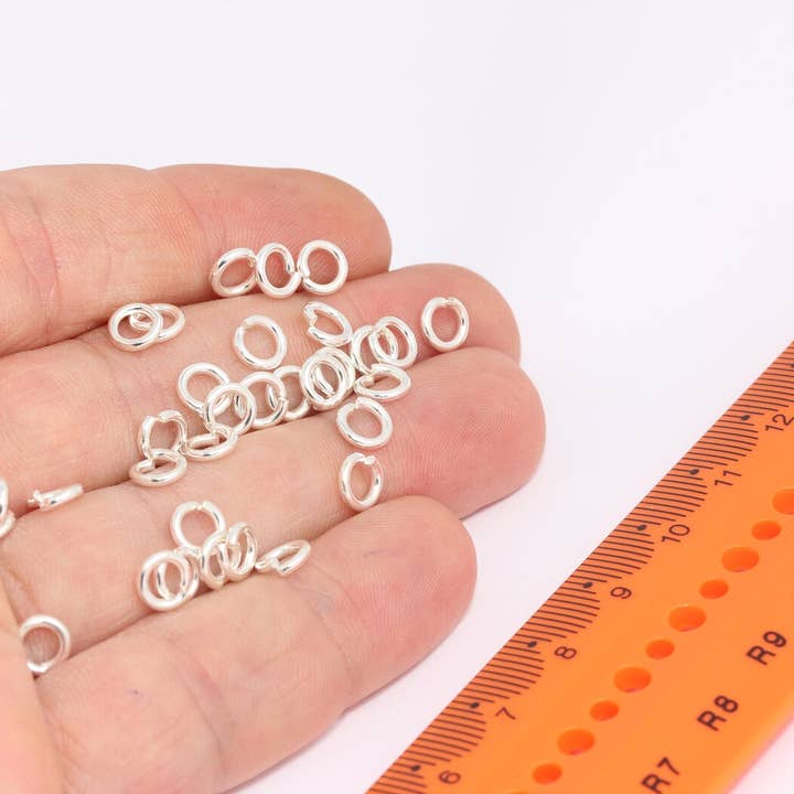 17 stk. 6mm rhodinerede springringe, forbindelsesringe, CR52 for engroshandel hos QueenJewelryM