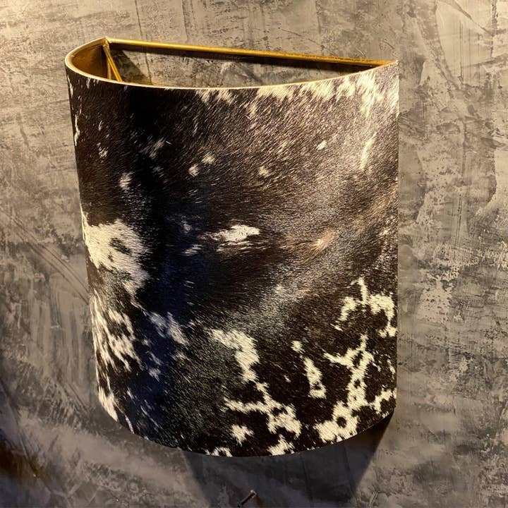 Semicircle wall lamp in metal and cowhide for wholesale by LES SCULPTEURS DU LAC