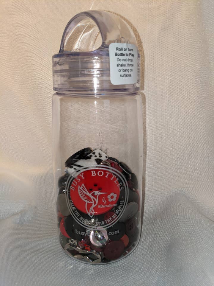 Busy Bottles - Red/Black Dementia Friendly Button Bottle for wholesale by MEternally