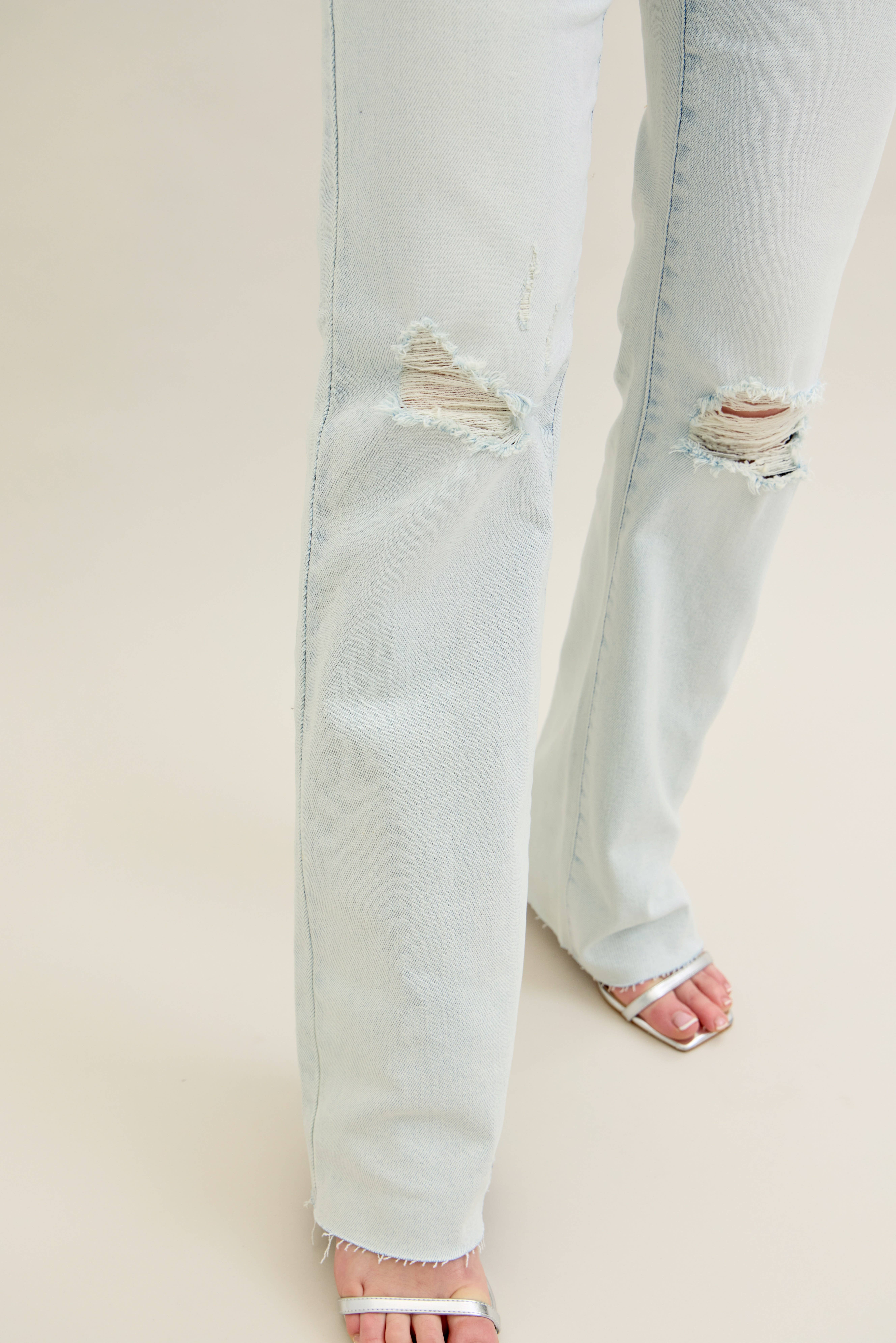 LT Mid Rise Distressed & Fray Hem Bootcut for wholesale on Faire1