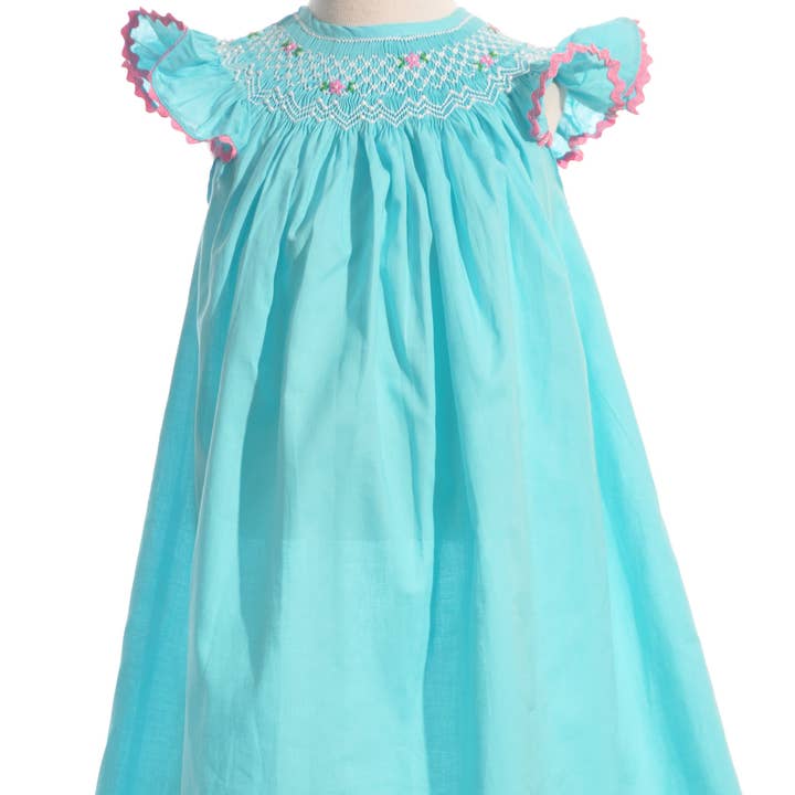 Turquise Geo Smocked With Pearls Angel Wing Sleeve Bishop Dress for wholesale by Hello Bebes!