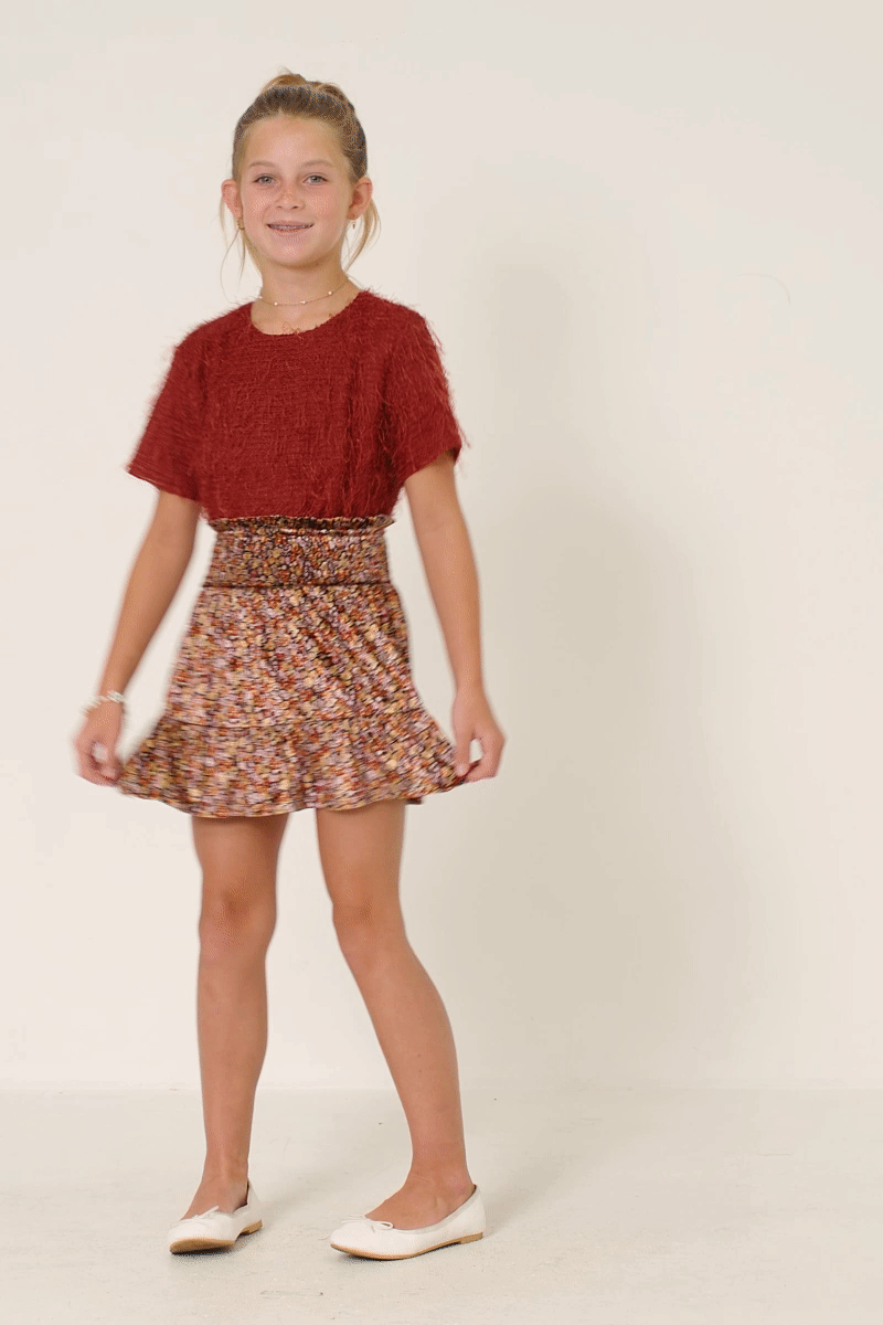 Óxido. Falda de Terciopelo con Flores y Nido de Abeja para Niñas en Capas de venta al por mayor en Faire1