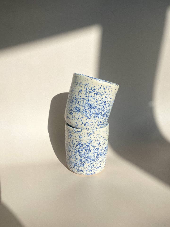 Splattered blue cup for wholesale by Lilas Clayground