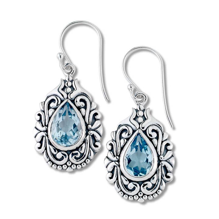 Pendientes colgantes de topacio azul con forma de pera SS para venta al por mayor de Eli Pebble