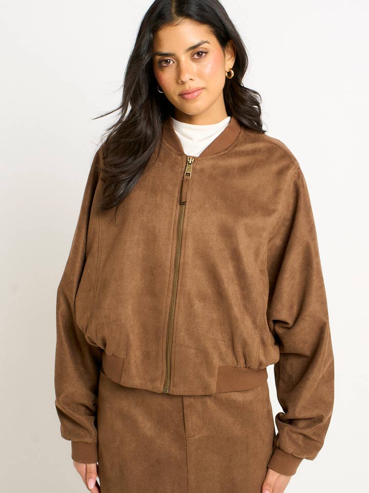 Veste boule en faux daim marron pour la vente par GINI LONDON