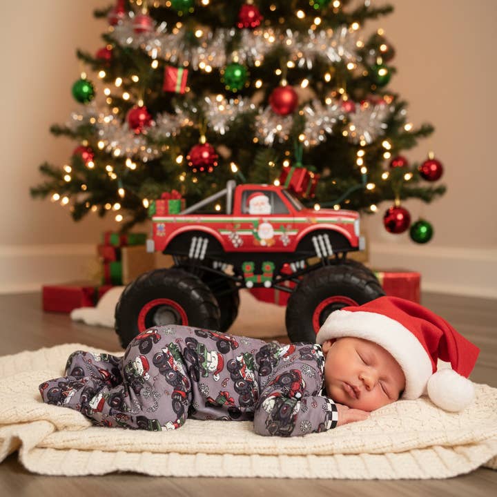Baby Christmas 2025 Pajamas Zippie Sleepers - Monster Truck for wholesale by Rufflеѕ & Bоwtіеѕ - Affordable Boys & Girls Clothing