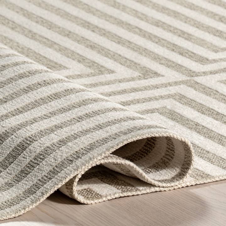 Cream Nicolai Graphic Fringed Reversible Machine Washable Area Rug for wholesale on Faire