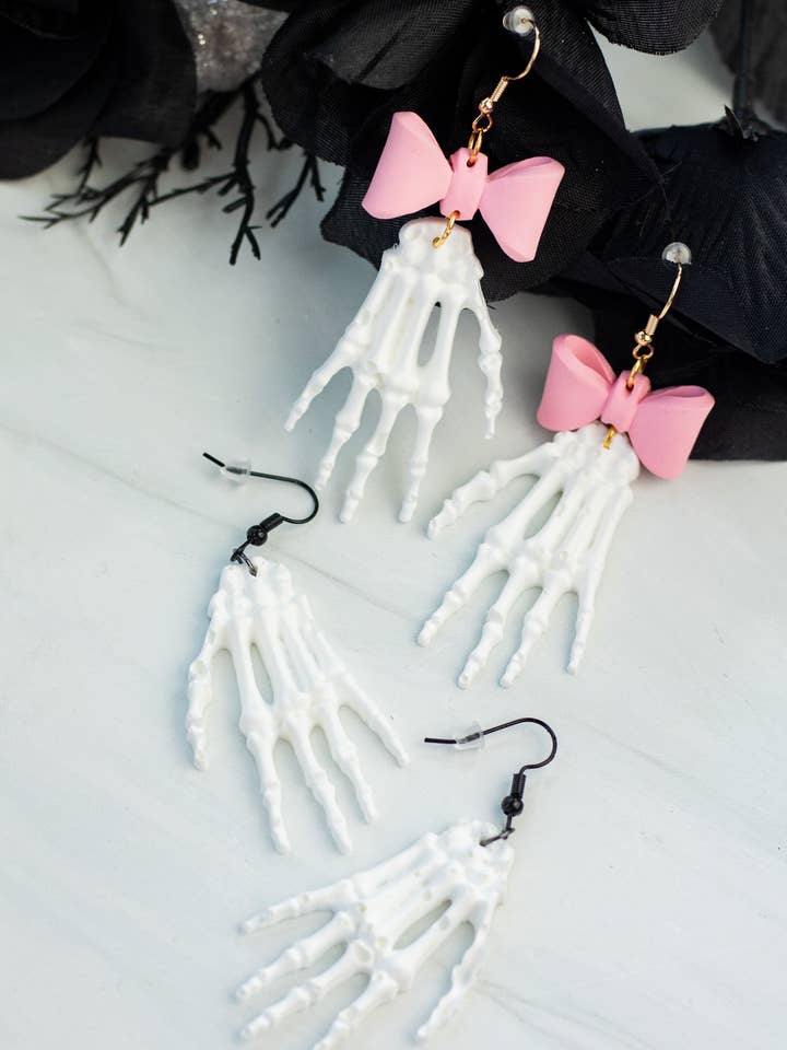 Skeleton Hand Dangles for wholesale by EJ Clay Co