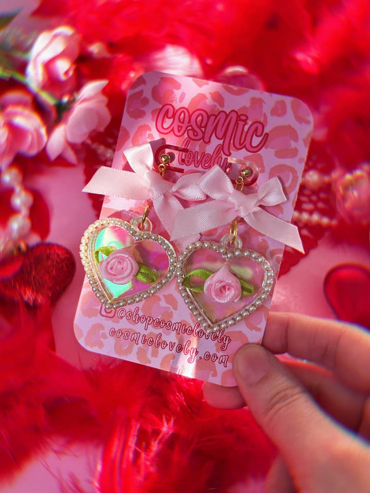 Iriserande rosa rosett Coquette hjärta örhängen för wholesale av Cosmic lovely