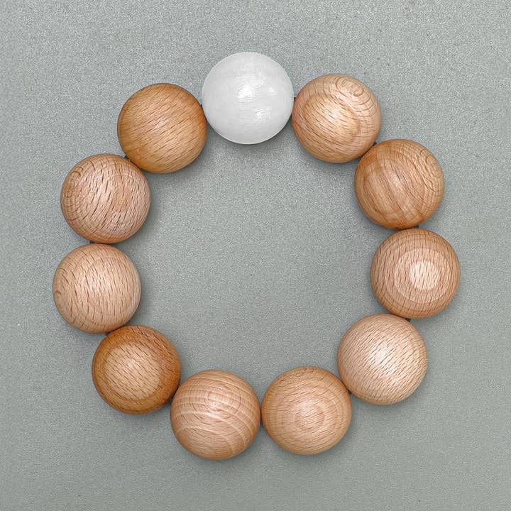 Nid - Bordskåner i massive bøgetræskugler for engroshandel hos Reine Mère