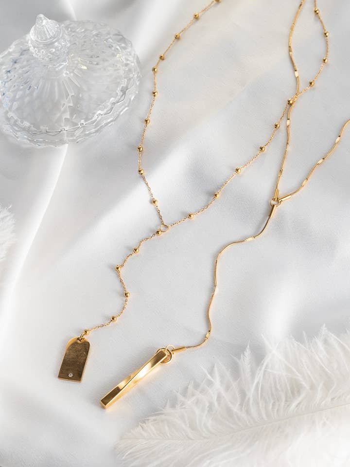 Lariat korte halskæder i guld for engroshandel hos Goupi