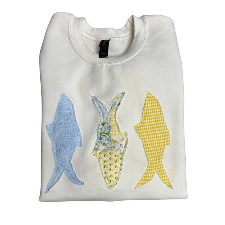 Colorful Patchwork Fish Sewn on a White Gildan Crewneck for wholesale by Slow Rise LLC