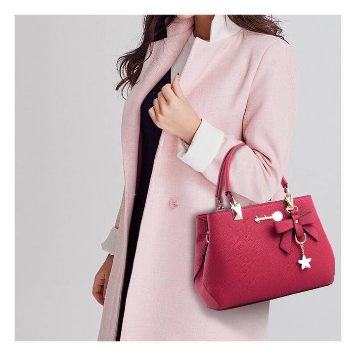 Borsa a tracolla in PU a forma di fiocco con farfalla per la vendita all'ingrosso da parte di Plush Looks