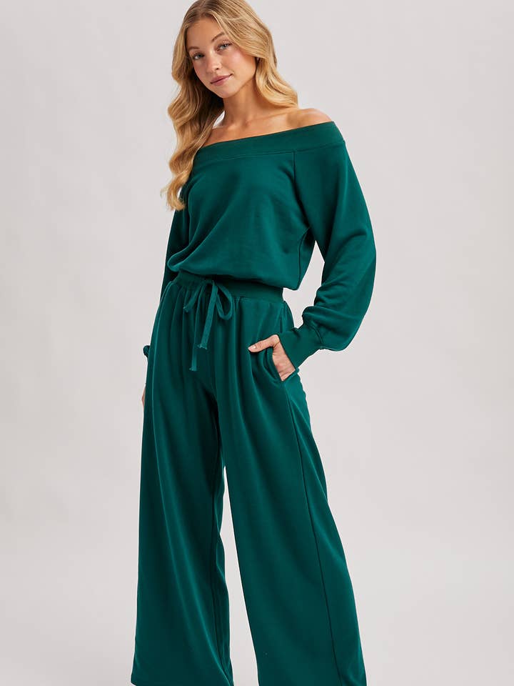 WIDE NECK OFF THE SHOULDER KNIT JUMPSUIT and other Purchase Wholesale striped jumpsuit. Free Returns & Net 60 Terms on Faire trending on Faire.