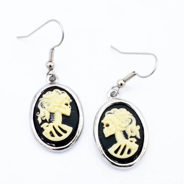Small Bone Skeleton Girl Cameo Earrings in Silver Tone for wholesale by Fizz