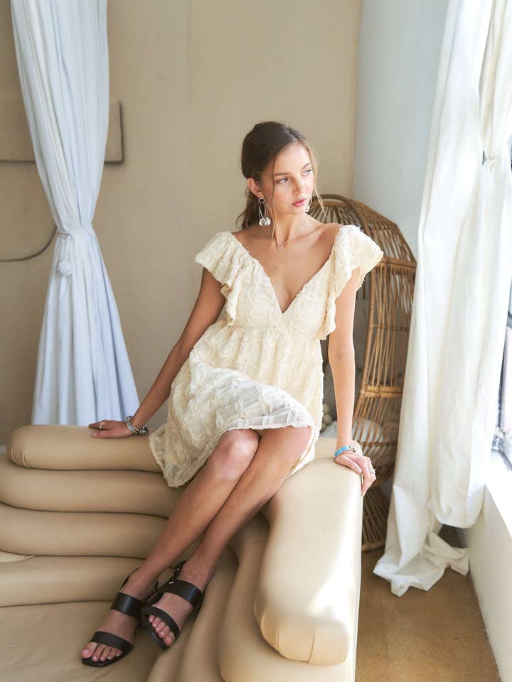 IVORY CED3532WN - OPEN TIE BACK BABYDOLL DRESS for wholesale on Faire