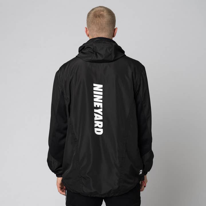 black SIGNATURE. vent half zip windbreaker jacket for wholesale on Faire7