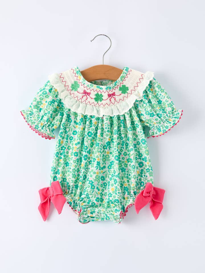 St. Patrick’s Day Shamrock Bow Smocked Baby Girl Romper for wholesale by Rylee Faith Designs