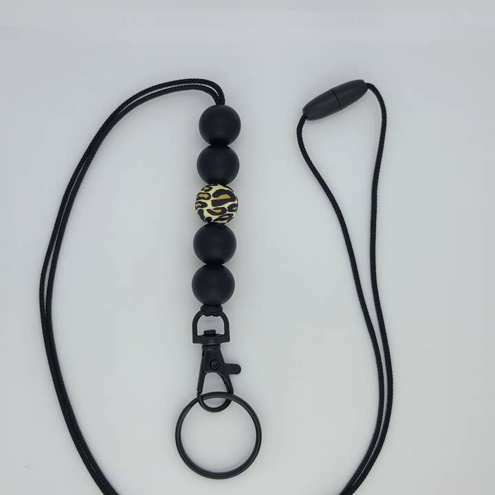 Kendra's Designs - Vente Lanière – femme - Longe perlée à imprimé léopard et noir