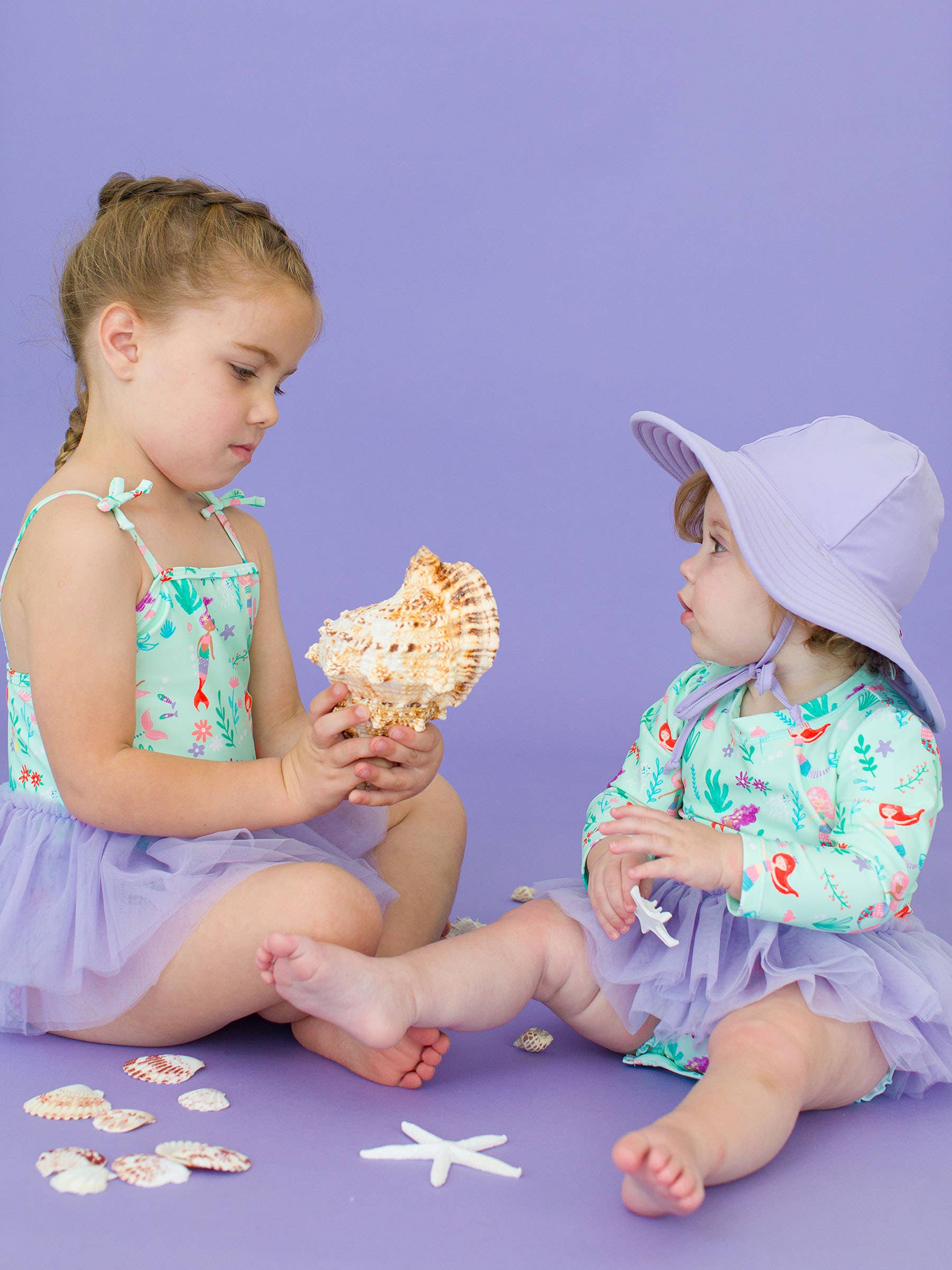 Viola Costume da bagno intero con protezione solare e gonna in tulle per bambine, principessa sirena. in vendita all'ingrosso su Faire11