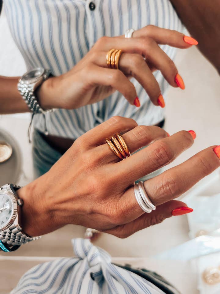 Thin boomerang ring in gold and silver for wholesale by Goupi