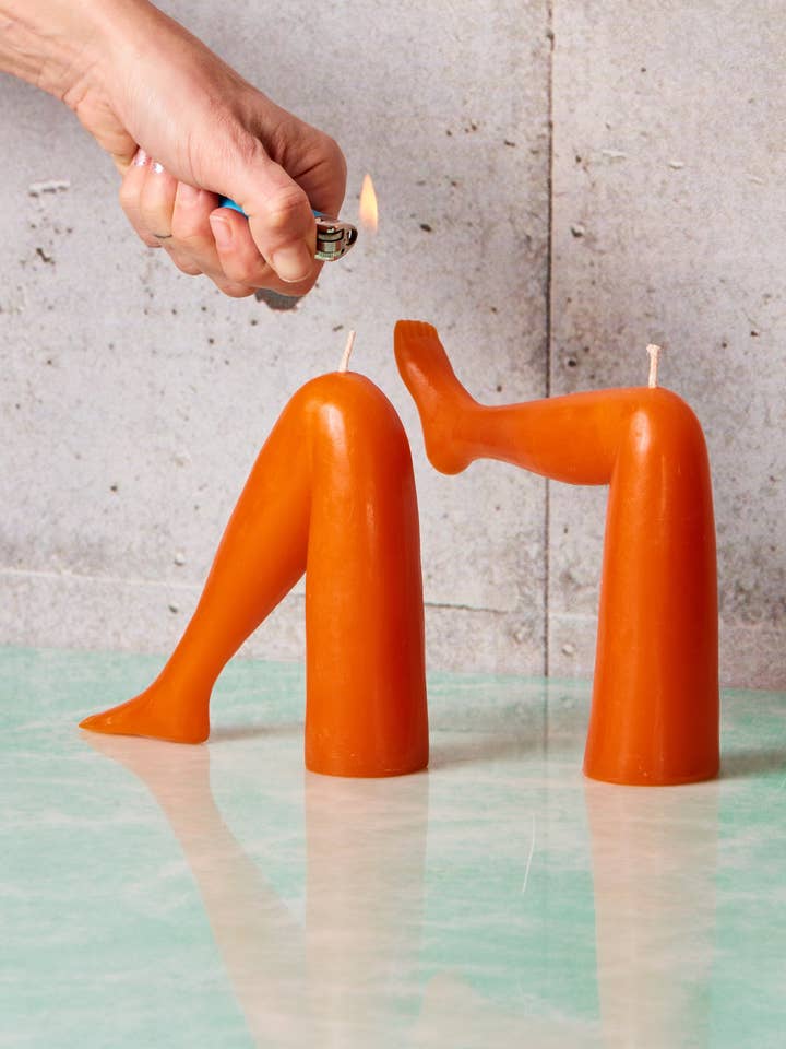 "Baby Won't You Light My Legs?" Candle for wholesale by Coming Soon