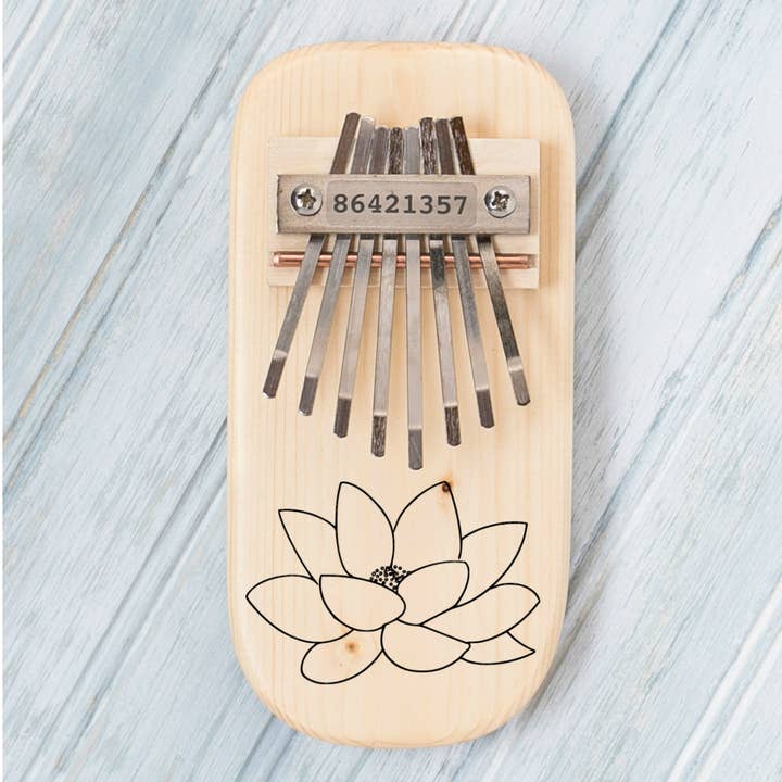 Lotus Engraved Thumb Piano for wholesale by Mountain Melodies LLC