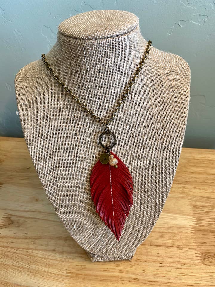 Red Leather Feather 30" necklace with charms for wholesale by Inspired by Jenna