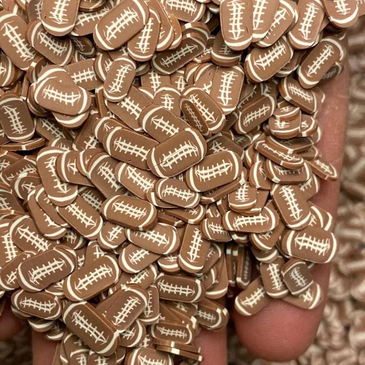 ASAP Craft Supplies - Wholesale Craft Supplies - Football Polymer Clay Slices 5mm. 0.5 oz bag1