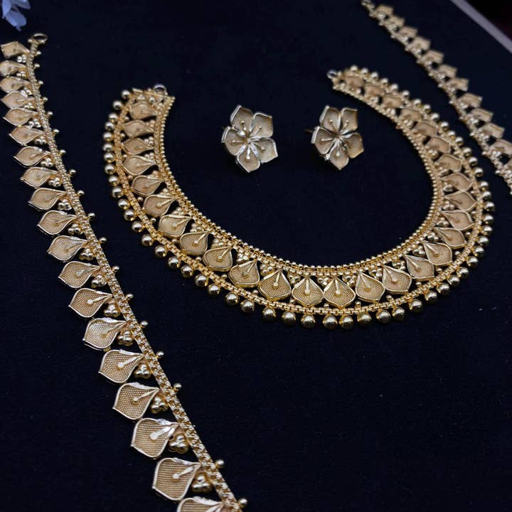 Quirky Fashions - Wholesale Jewelry Set - Handcrafted Gold-Tone Temple Jewelry Set With Earrings