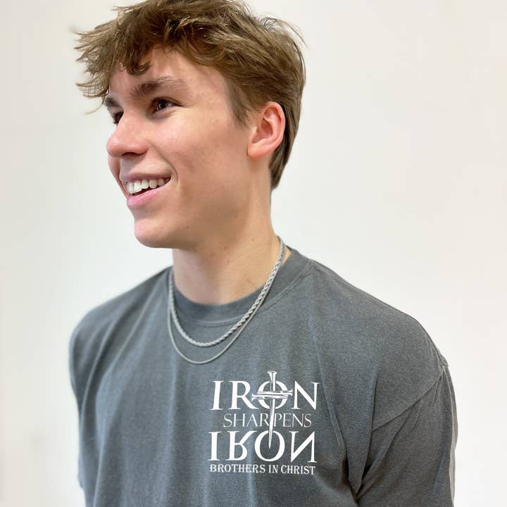 IRON SHARPENS IRON BROTHERS IN CHRIST UNISEX PEPPER TEE for wholesale by Dwell Apparel