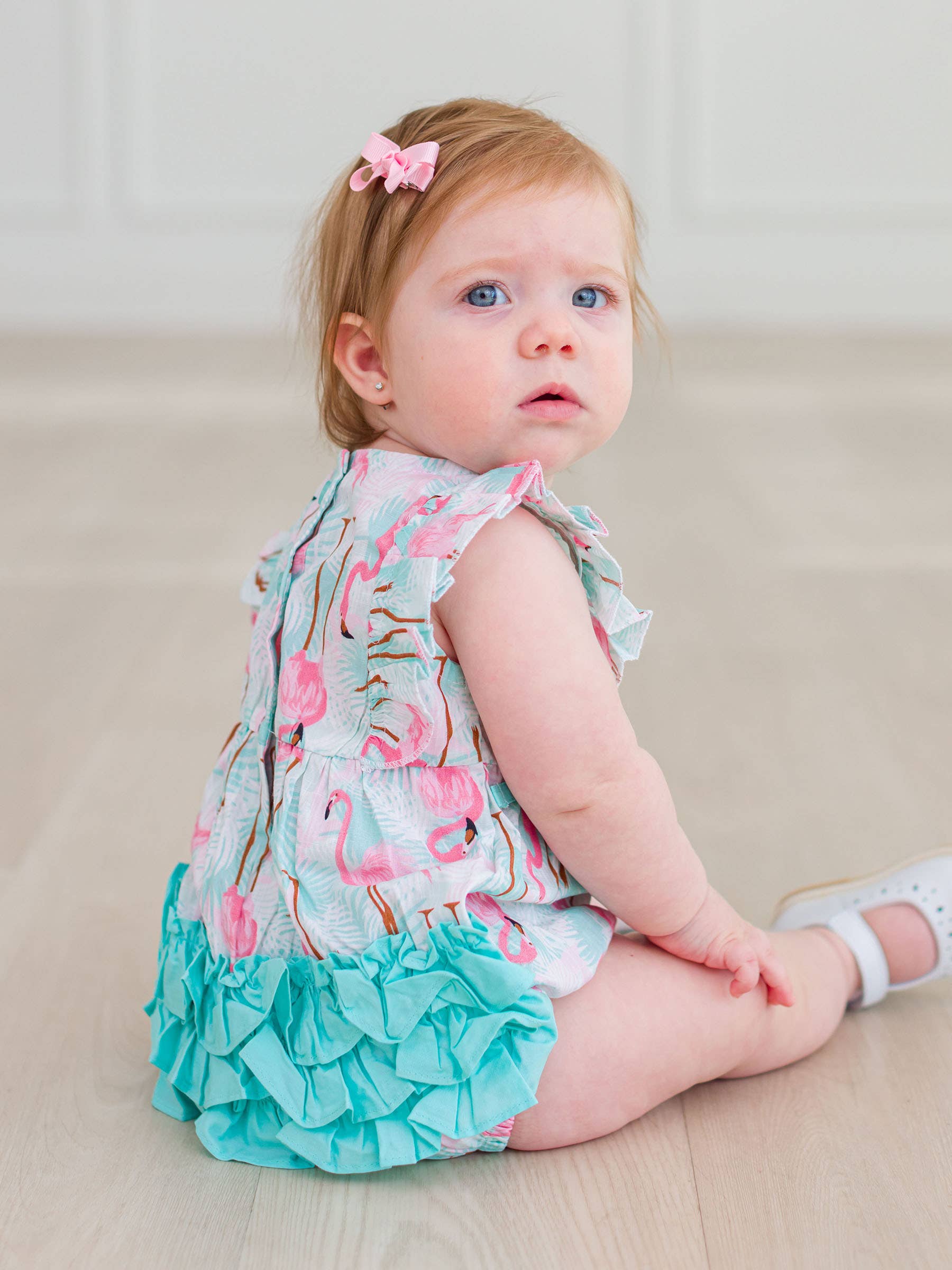 Multi Color Baby Girls Vibrant Flamingo Classic Ruffle Bubble Romper for wholesale on Faire1